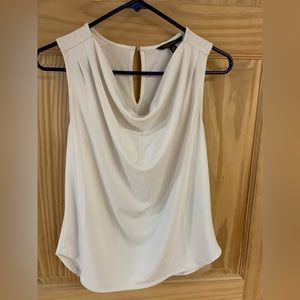 Women’s white swoop neck blouse.
